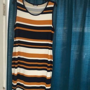Venus XL Jersey type stripped dress. Navy blue cream and a goldish colors